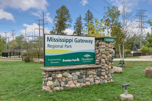The home is steps away from a walking path that connects to the trails of Mississippi Gateway Regional Park (MGRP). Enjoy walking, biking, playgrounds, dog park, splash pad, boating, fishing, archery, showshoeing and classes at Gateway Center.