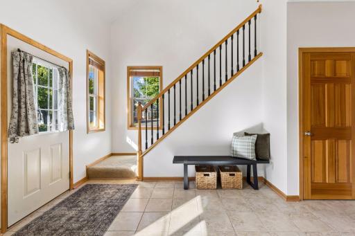 A spacious light filled foyer welcomes you into the home.