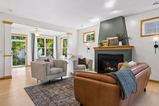 Cozy up to the stunning gas fireplace in the living room.