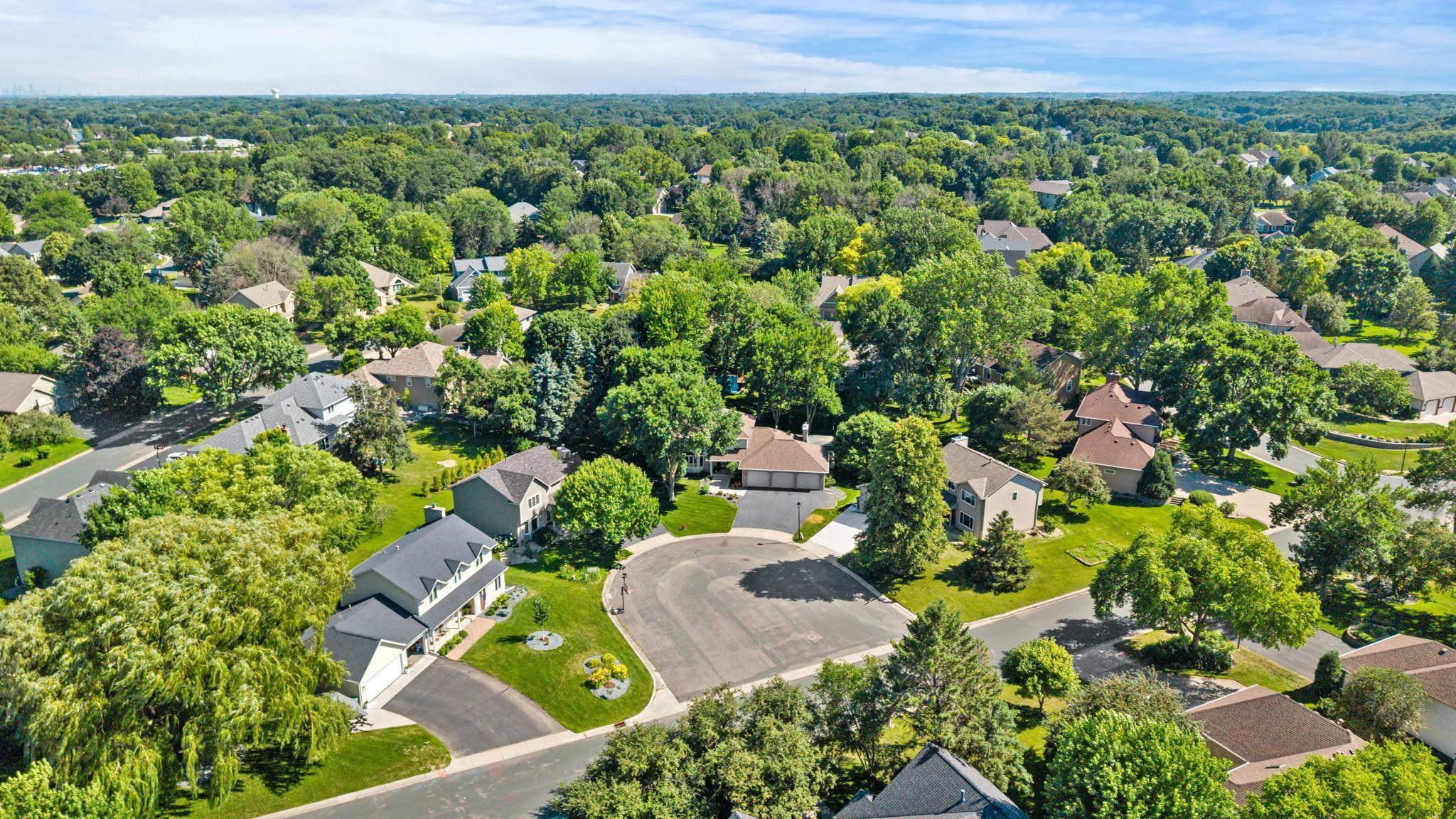 This property offers a wonderful combination of character, spacious living areas, beautiful finishes, and a peaceful backyard setting, all in a location close to local lakes, parks, schools, Elm Creek, and the Shoppes at Arbor Lakes.