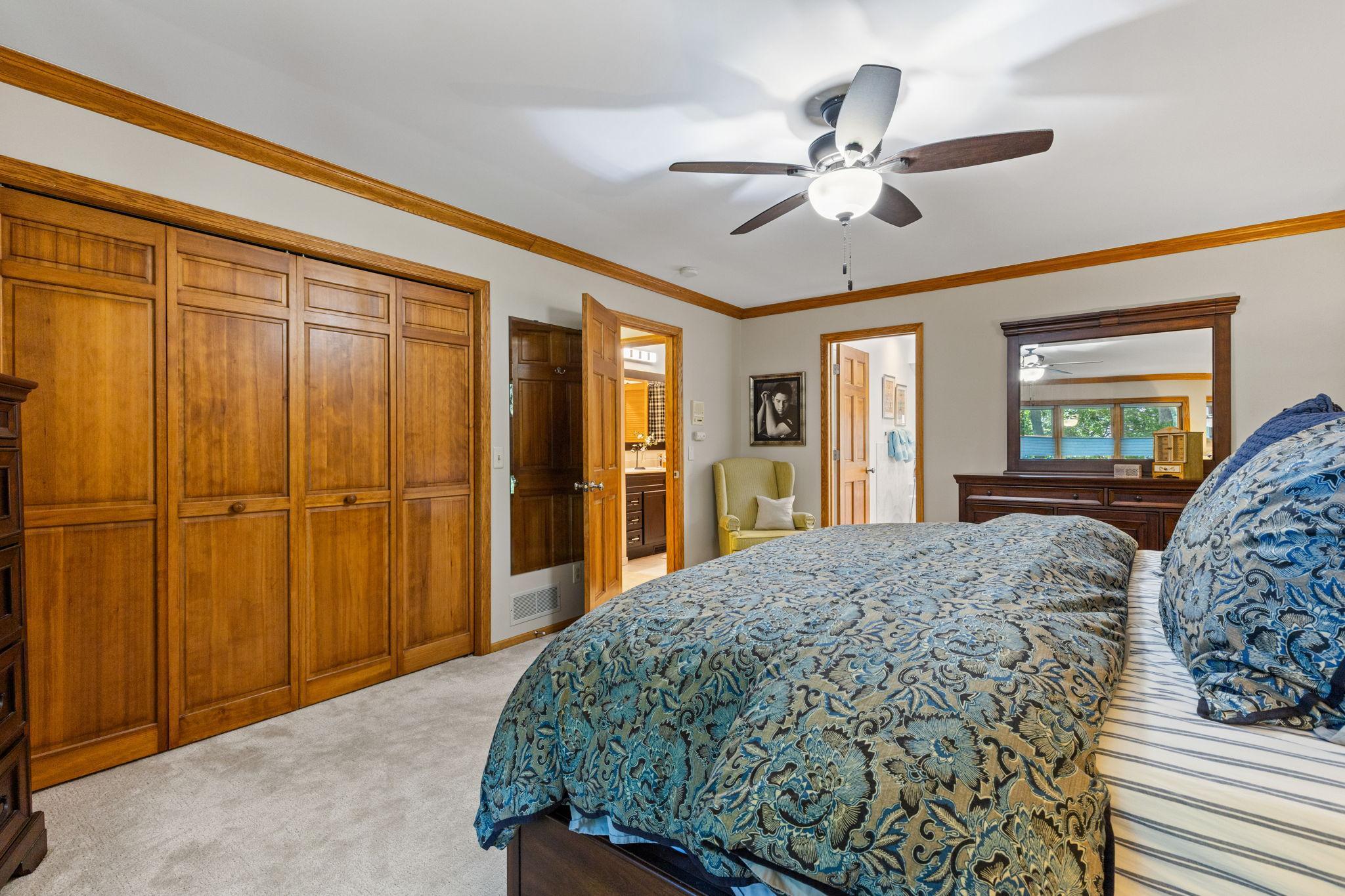 Enjoy detailed trim, ceiling fan, updated windows (2025), and cozy carpeting.