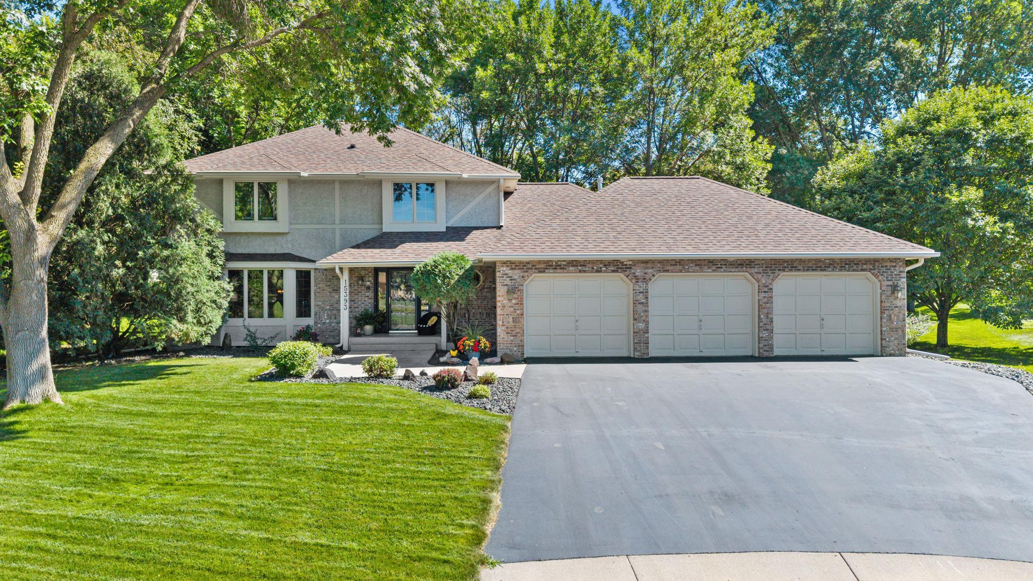 Finished three-car garage with a durable Polyurea floor coating!