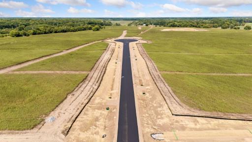Professional photos are taken of the entire development and may include other parcels.