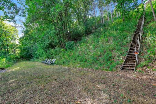 Vacated Railroad bed just before the River. Great level grassy area for tents, picnics, camp fires, etc.