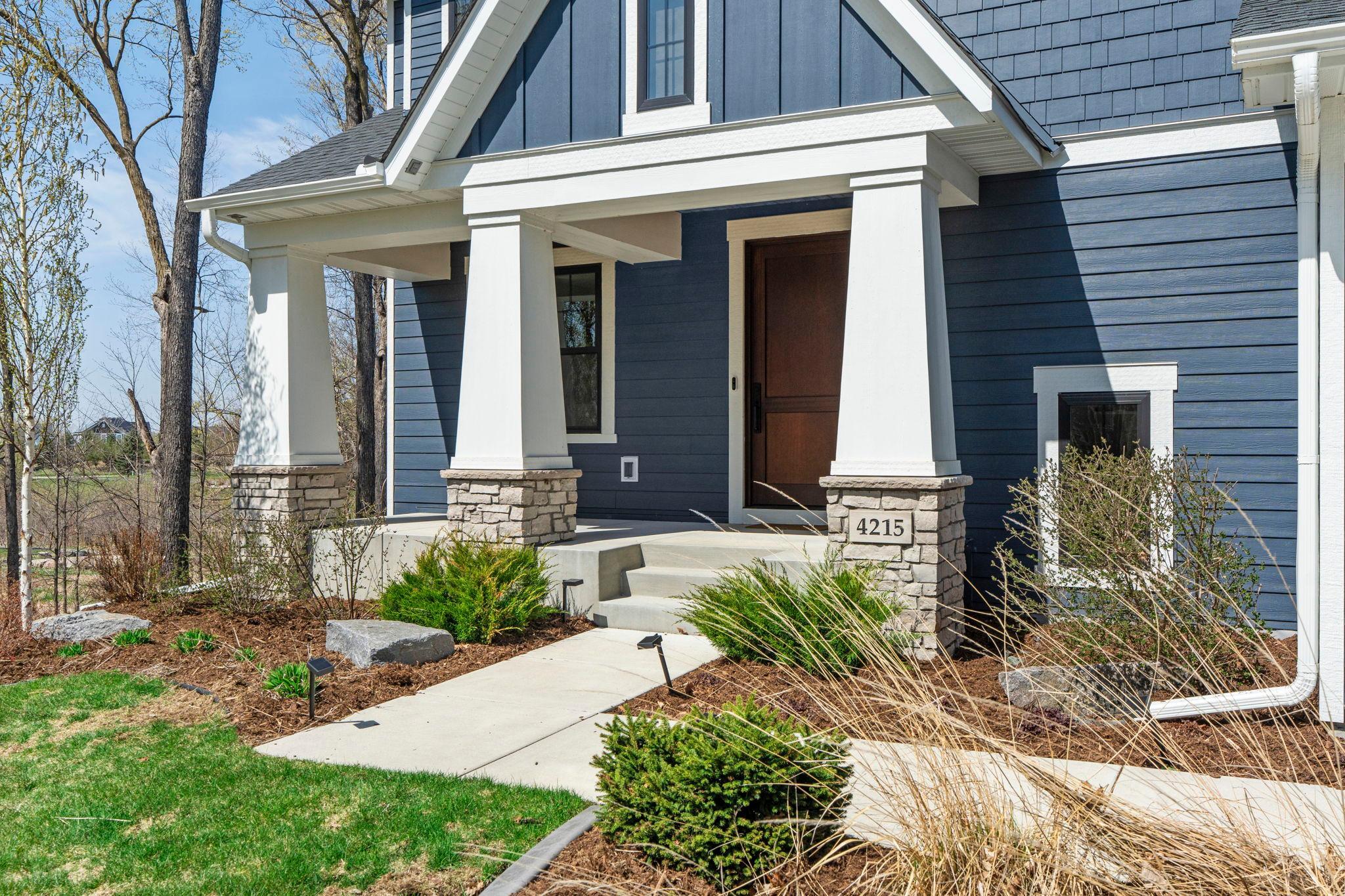 Impressive wood front door to welcome you home