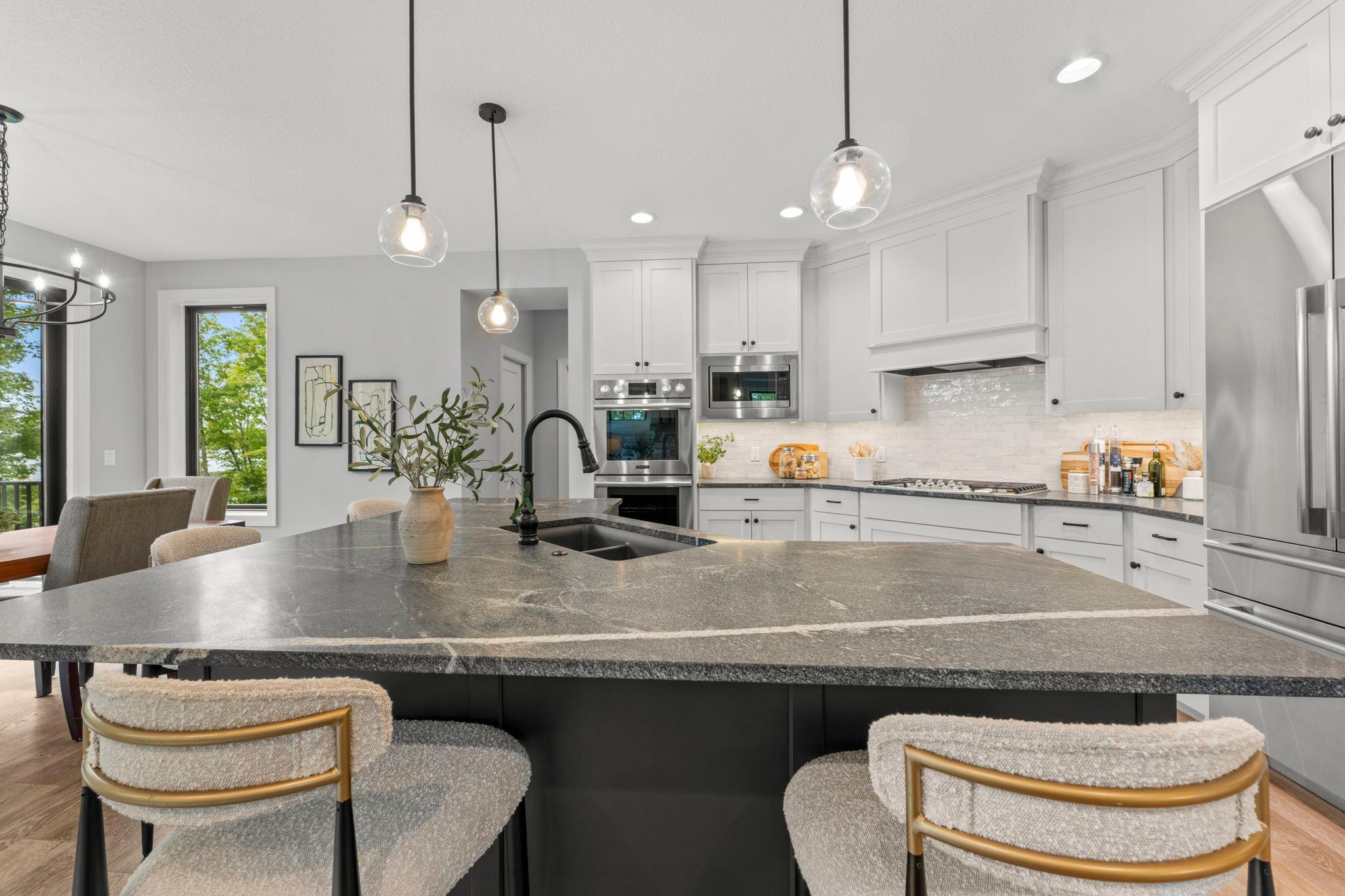 Beautiful gourmet kitchen at the center of the open main floor