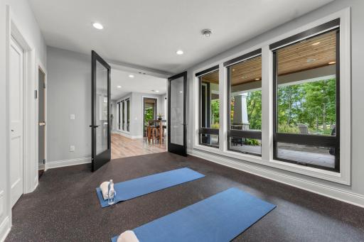 Lower level exercise room, complete with sauna and an extra washer & dryer