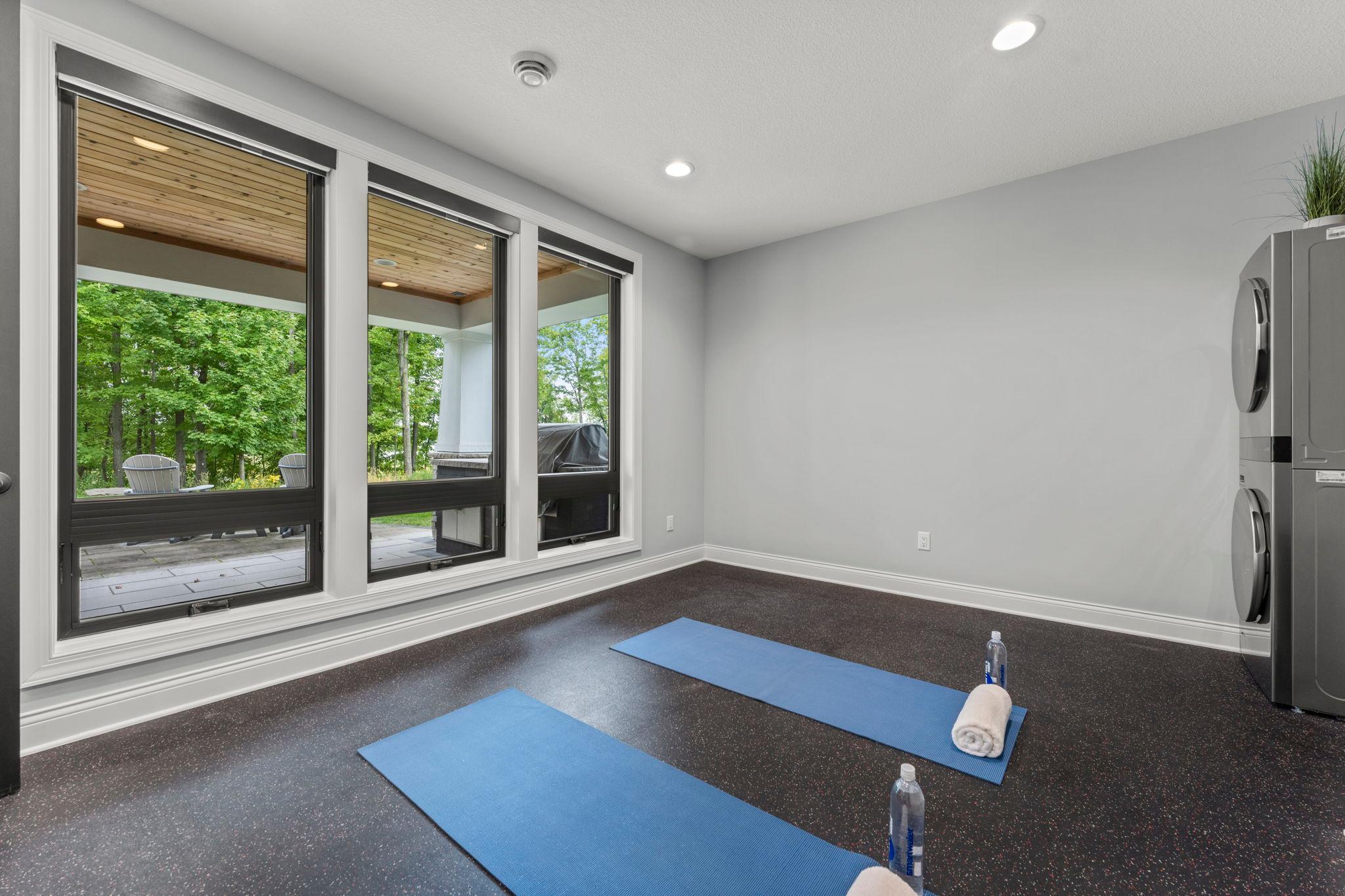 Lower level exercise room, complete with sauna and an extra washer & dryer