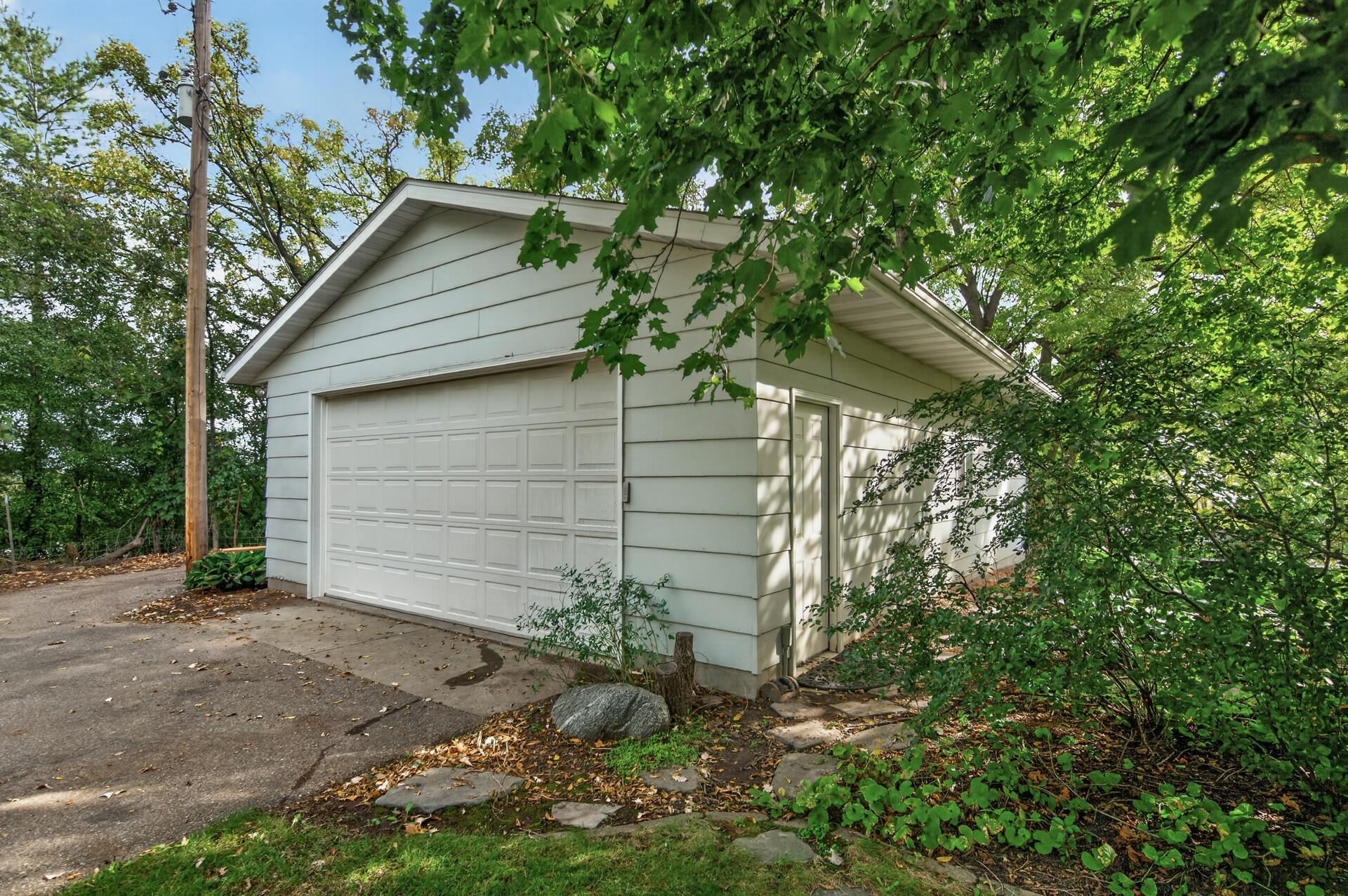 Your spacious, insulated, heated, detached garage. Equipped with a floor drain and hoist!