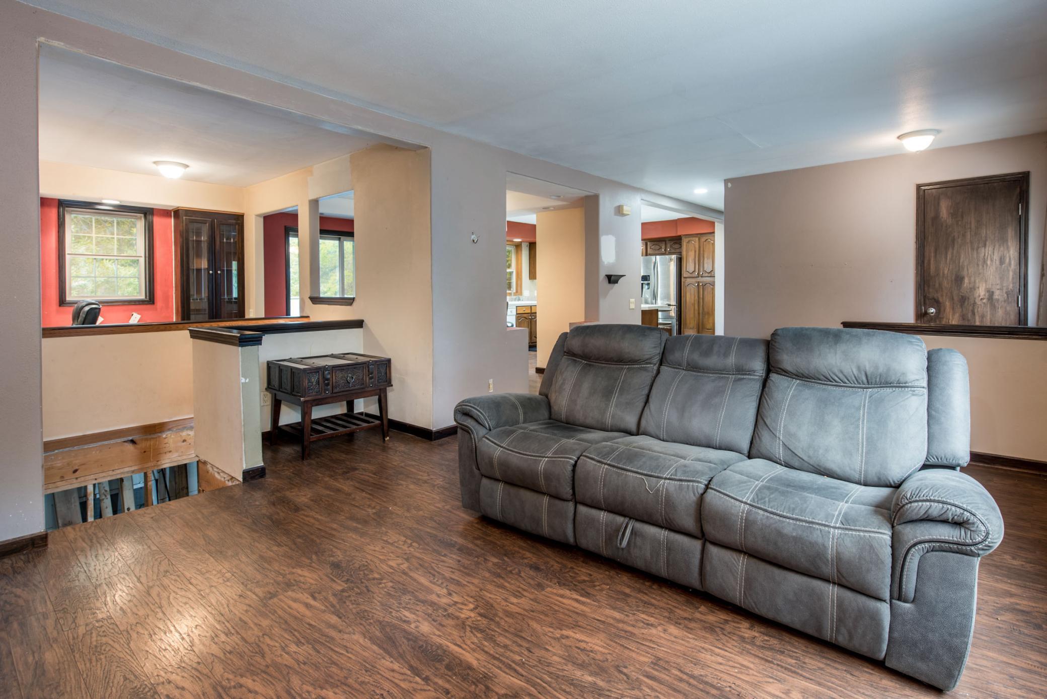 Living room w/office, dining, & kitchen beyond