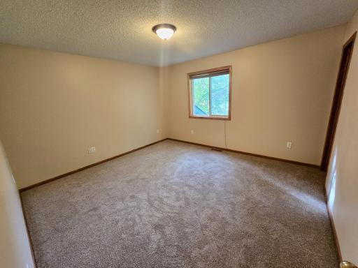 Upper level main bedroom with walk-in closet