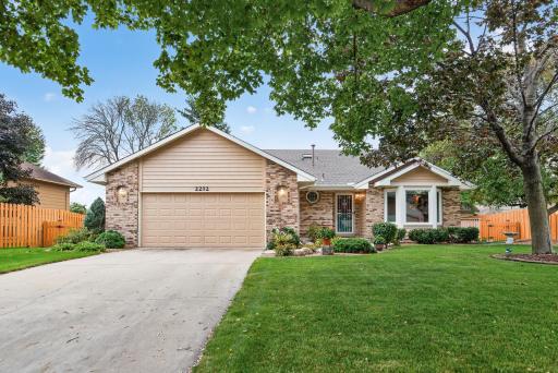 Concrete driveway, inground sprinklers, storm door - beautiful bay window - this one is a must see!