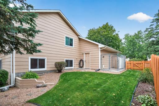 Kennel, private fenced-in back yard and impeccably maintained yard for you to enjoy!