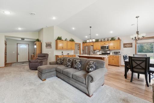 Large entry foyer for those long Minnesota goodbyes. With no steps inside or out, 36" doorways and 42" + hallways, access in and around this property is easy for everyone!