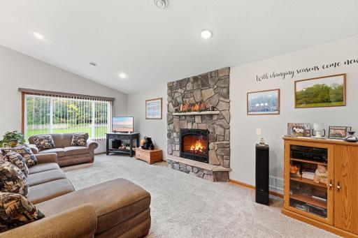 Welcoming you in to this custom built home is the cozy family room. Snuggle up in front of the gas fireplace. In floor heating throughout the home keep your toes warm on the cold Minnesota winter days!