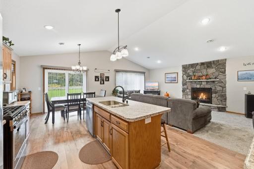Every detail has been thoughtfully consideredâdown to the hidden convenience of electrical outlets built into each end of the island.