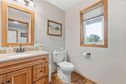 Smartly designed for maximum convenience, this 1/2 bath is ideally situated right off the laundry room and directly opposite the garage entry.
