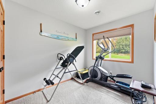 The versatile 4th bedroom features acoustically insulated walls to keep noise contained, creating a peaceful private retreat ideal for an ultra-focused home office or high-energy gym.