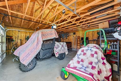Interior of detached 2 car garage. Perfect space for hobbies, storage and more.