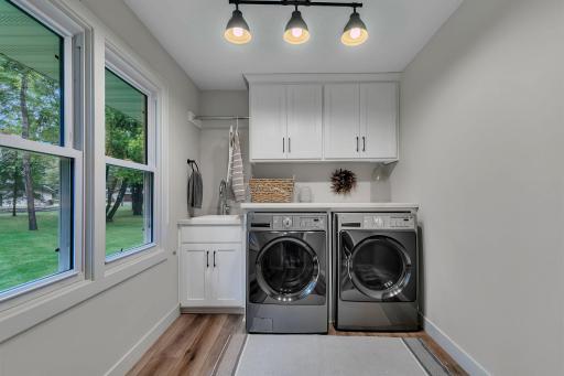 Main level laundry room with daylight windows!