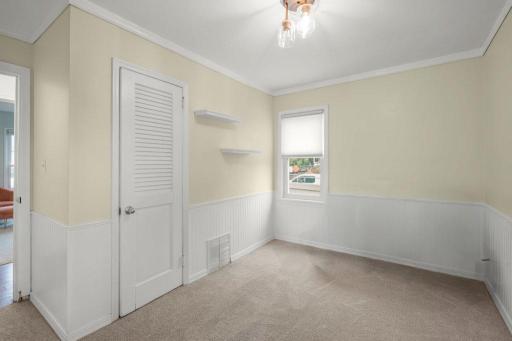 The second main-floor bedroom offers another comfortable, flexible spaceâideal for guests, hobby room, or whatever suits your needs.