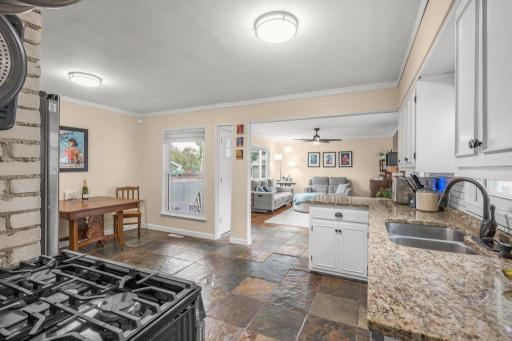 The open flow between the kitchen and family room fits the way we live todayâeasy conversation, effortless entertaining, and plenty of space for everyone to stay connected.