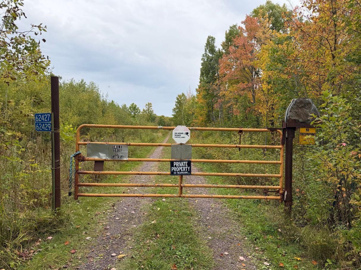 GATE AT ROAD LOOKING NORTH