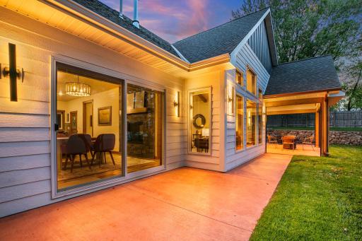 Stunning lakeside-inspired architecture with intentional lighting that creates an inviting, resort-like ambiance.