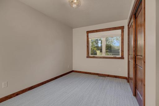 Bedroom 2 features wall closet (2nd furnace), wired switch for future fan, window feature motorized window treatments .