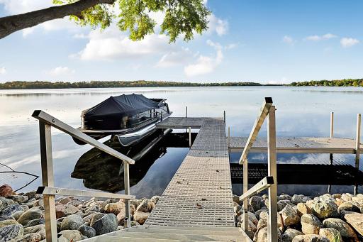 Easy lake access from your private dock with panoramic lake views with clear, open water.