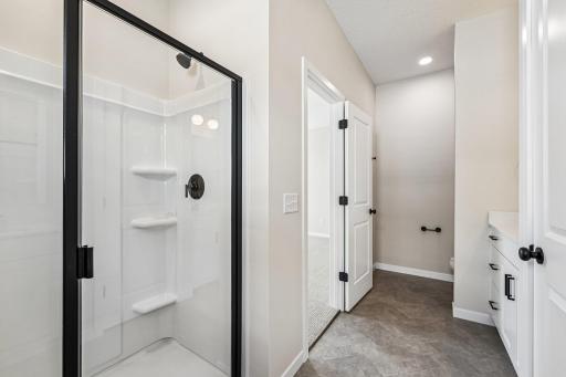 Primary Bathroom. Welcome to the Eveleth Patio plan by Robert Thomas Homes. Photos are of similar home; options and features will vary.