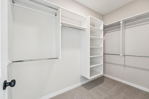 Primary Closet. Welcome to the Eveleth Patio plan by Robert Thomas Homes. Photos are of similar home; options and features will vary.