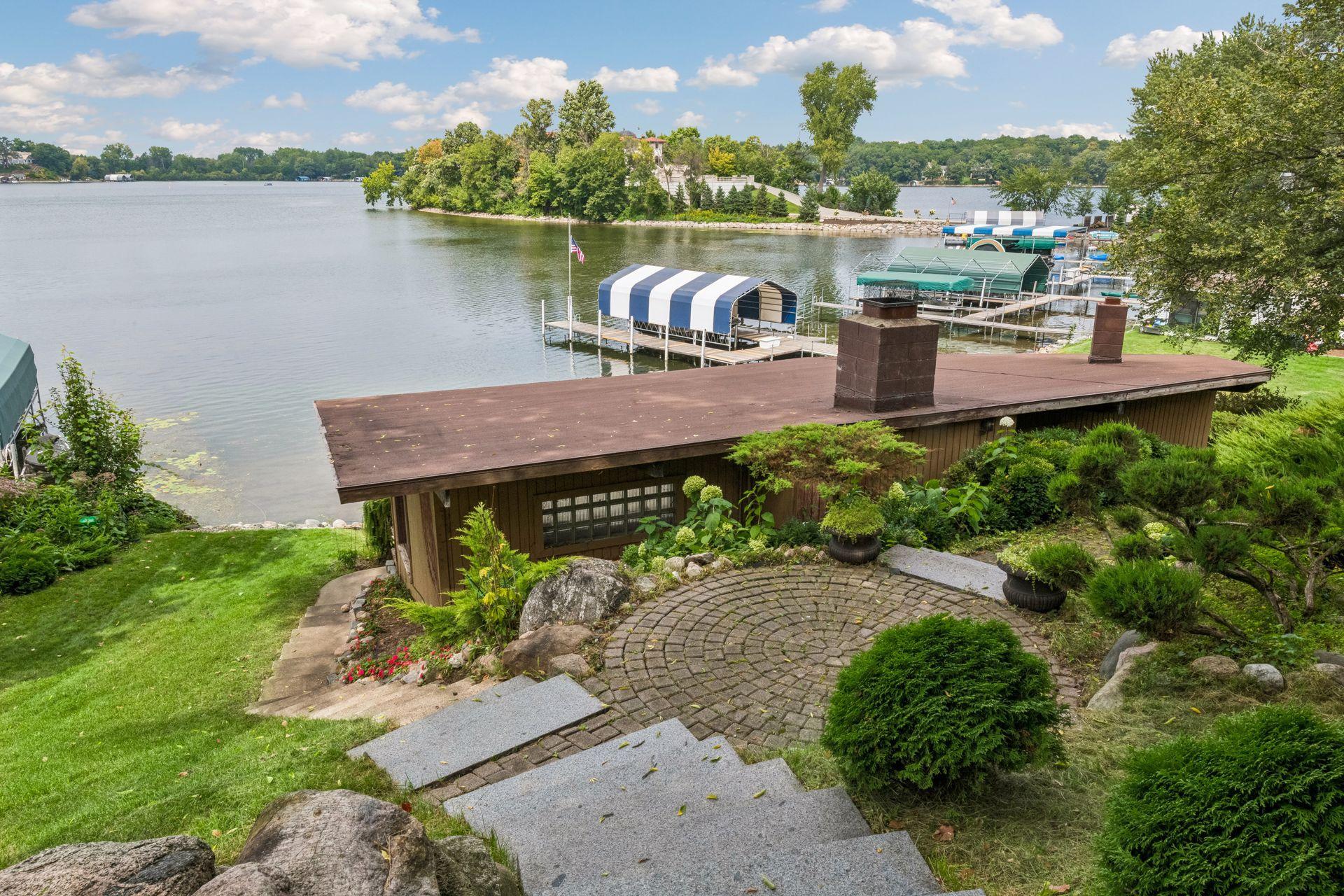 Enjoy beautiful St. Albans Bay views from behind the existing boathouse