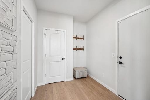 Large mudroom coming off garage. Photos are from similar home; colors, options and features will vary.