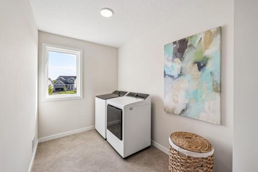 Large upstairs laundry! Photos are from similar home; colors, options and features will vary.