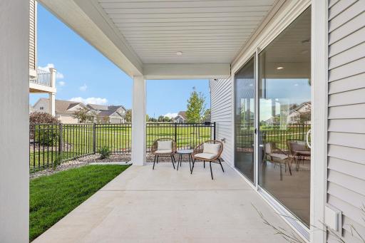 Large covered patio. Photos are from similar home; colors, options and features will vary.