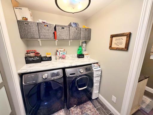 Main level Laundry room off kitchen with 1/4 bathroom.jpg