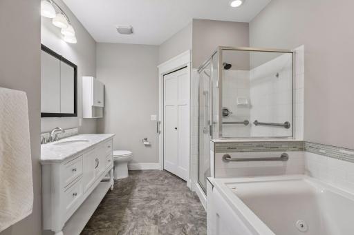Ensuite complete with separate shower, jetted tub and walk in closet.