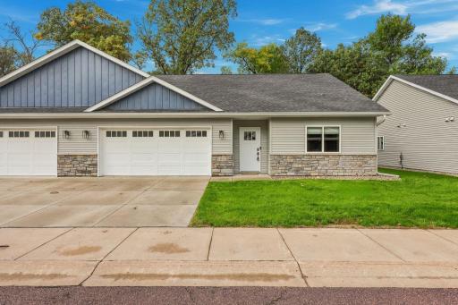 Move in and enjoy maintenance free living, nestled on a quiet street w/ a nice, wooded backyard view!