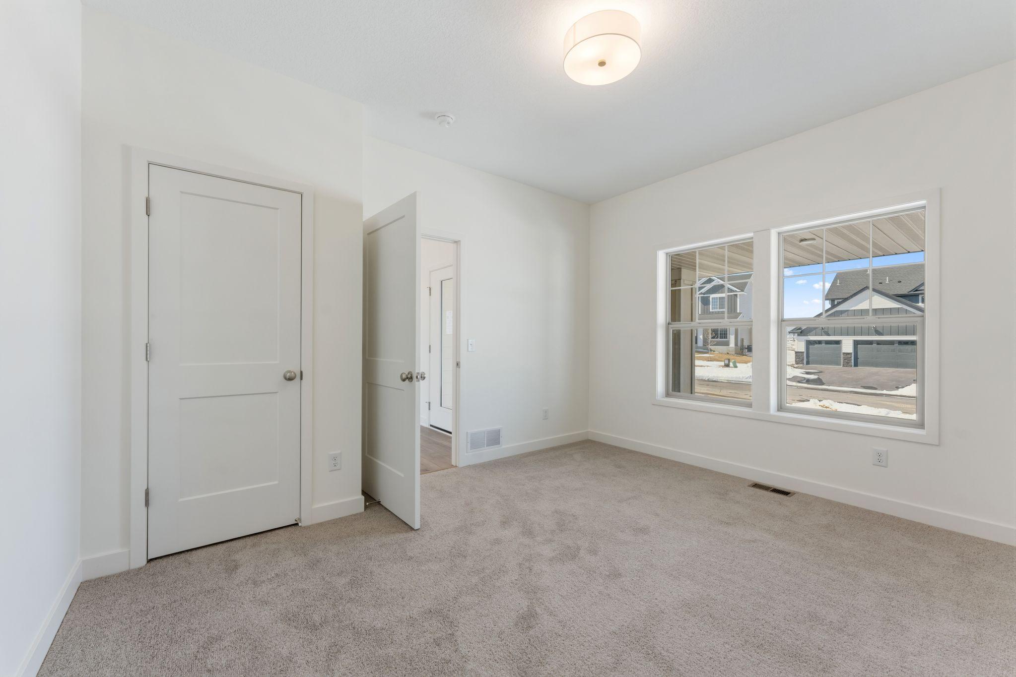 Front flex room can be used as a bedroom with closet and 3/4 bath on main level