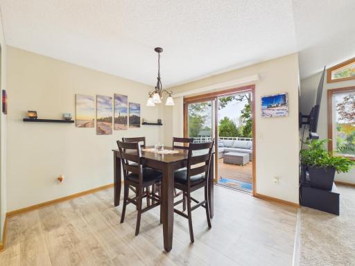 Dining area beside the kitchen with natural light and direct outdoor views
