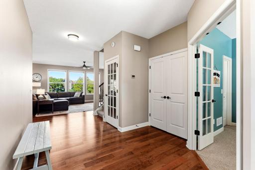 A clear line of sight connects the front entry to the living spaces, showcasing the home's open-concept design and functional flow.