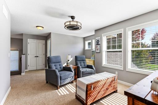 The loft sits towards the front of the house. The current view is looking at the stairs and front bedroom.