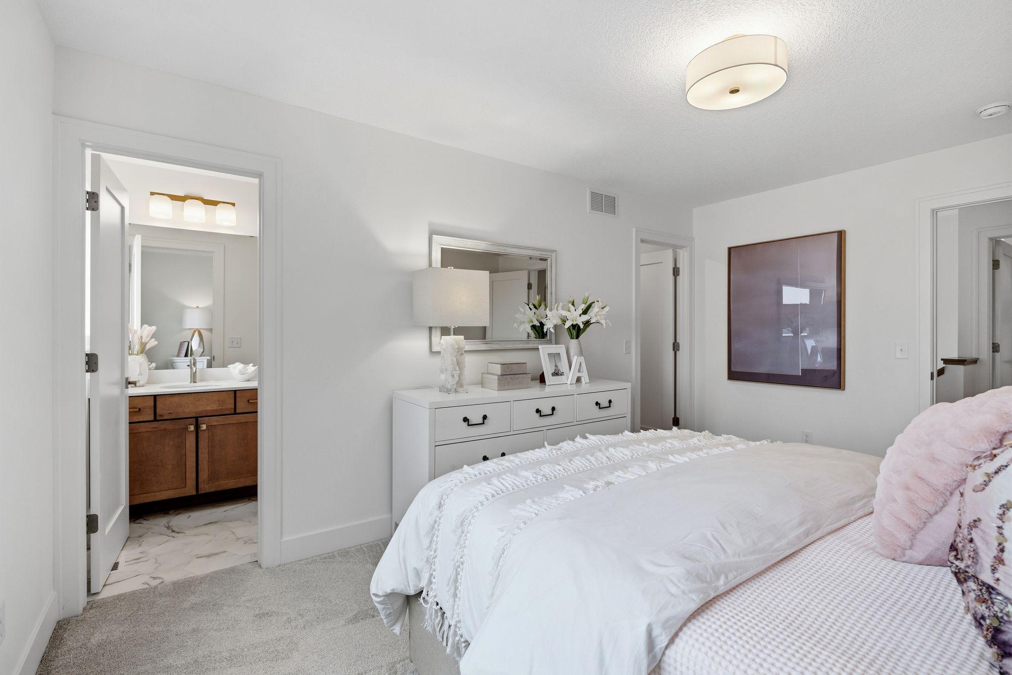 Generously sized bedroom with walk-in closet.