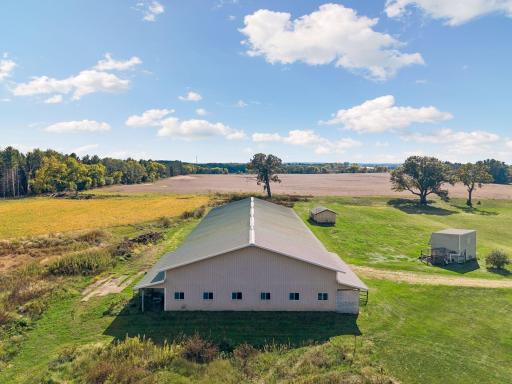 Barn with horse stalls and large riding ring