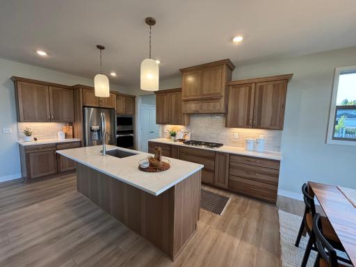 Dream gourmet kitchen with Hickory cabinets
