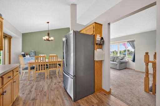 Open-concept layout connects the kitchen, dining, and living areas for easy everyday living and entertaining.