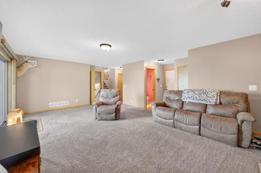 Expansive main-level family room offers plenty of space for comfortable everyday living and entertaining. Such a great space.