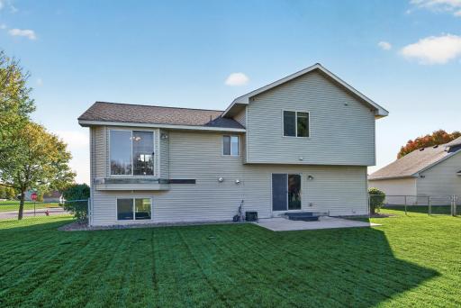 Expansive fully fenced backyard with a lush lawn and plenty of room to play, entertain, garden or simply relax outdoors.