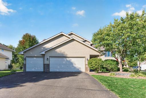 This home has mature landscaping, an asphalt driveway and an oversized three-car garage offering plenty of room for vehicles, toys, storage and more.